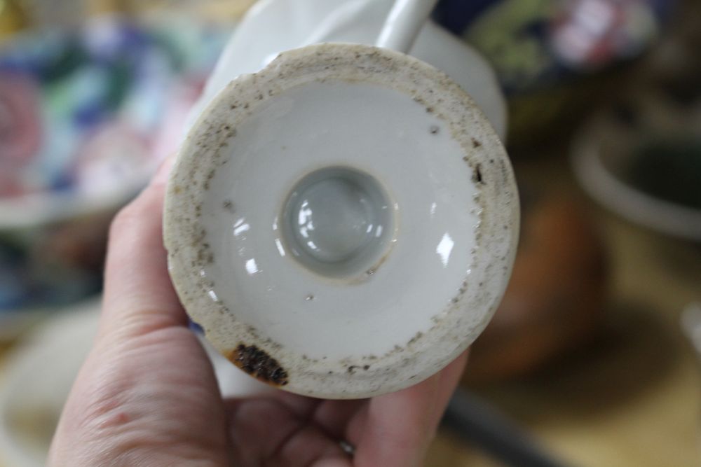 A Chinese blue and white jug, Japanese lacquer box and mixed Japanese ceramics